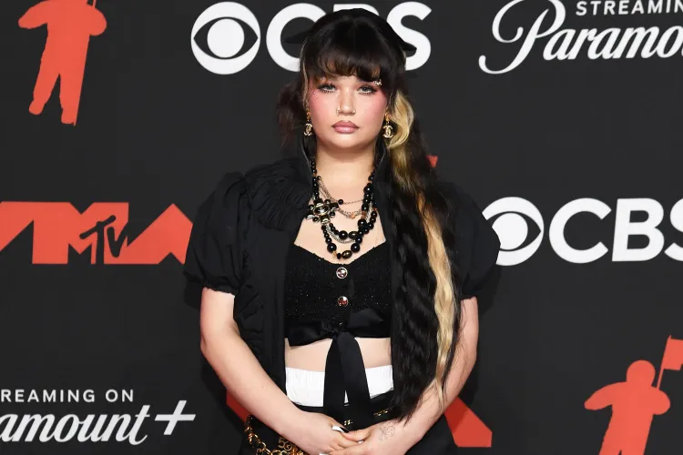 Lola-Young-attends-the-2025-MTV-Video-Music-Awards-at-UBS-Arena-091225-dbe3e0a286f942c29785aa...webp